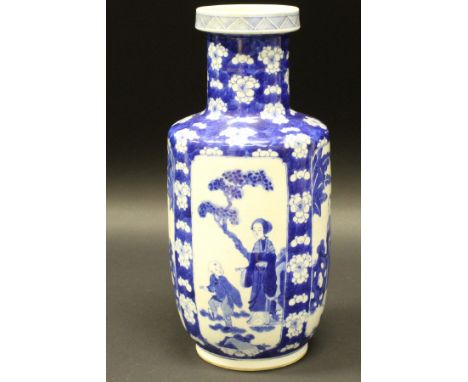 A 19th Century blue and white Chinese Roulade vase, the main body decorated with panels of figures in a garden setting on a p