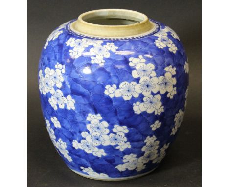 A Chinese Kangxi ginger jar with all over prunus blossom and cracked ice decoration, bearing underglazed blue double ring mar