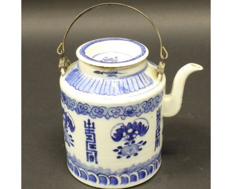 A Chinese blue and white porcelain teapot with allover floral spray and script decoration to the cylindrical sides, together 