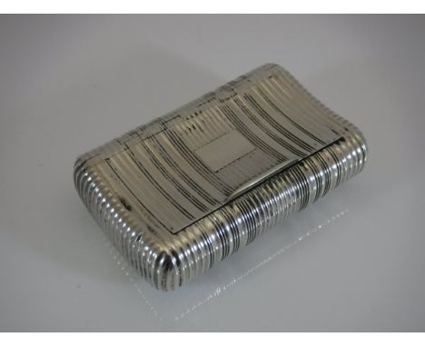 An early 19th Century silver snuff box of curved rectangular form with all over fluted decoration opening to reveal a gilt wa