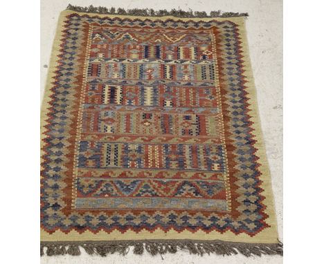 A Kelim rug, the blue, light blue, red and oatmeal decoration on a red ground, 204 cm x 138 cm
