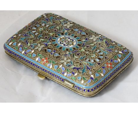 A Russian silver (84 Zlotnik) and plique à jour decorated cigarette case with all over scrolling foliate decoration in blues 