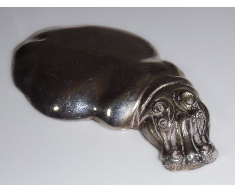 A Patrick Mavros silver paperweight of small proportions of a submerged hippo figure, (Patrick Mavros, Colony of Zimbabwe 199