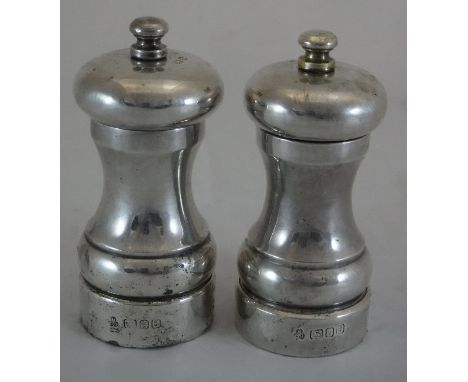 A Peter Piper silver peppermill and matching salt mill (by M C Hersey & Son Limited, London 1991 and 1992), approx 10.3 cm hi