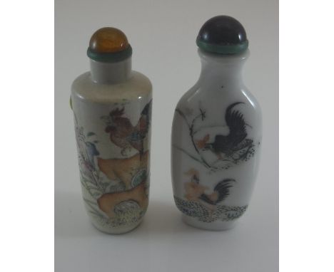 A Japanese Meiji period pottery cylindrical snuff bottle decorated with cockerel crowing upon a rock with amber bead stopper,