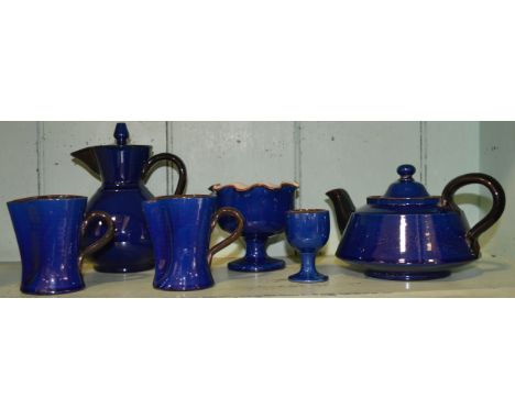 Watcombe Torquay blue glazed teapot, 2 jugs, egg cup, hot water jug & sugar bowl 