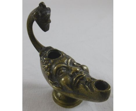 Brass oil lamp in gruesome face form 3.5"h 