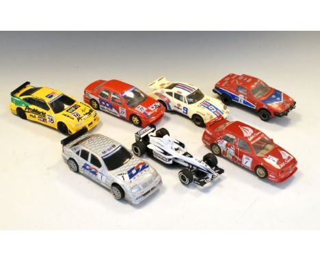 Group of seven 1:32 scale racing slot cars by Hornby Hobbies and Scalextric, all loose  