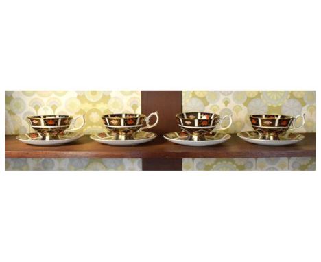 Set of four Royal Crown Derby Imari pattern 1128 tea cups and saucers (struck through mark on cups)  