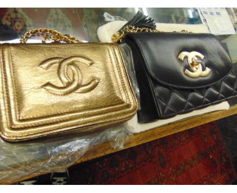 Two vintage designer style handbags