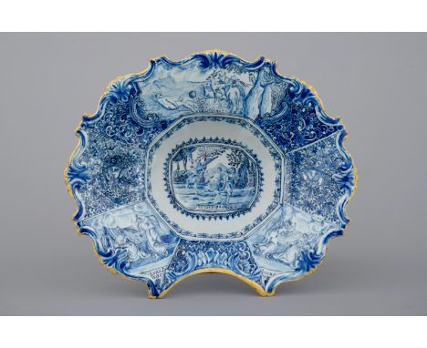 A fine Dutch Delft blue and white shaving basin with a biblical scene and dated 1803 H.: 8 cm, L.: 28 cm, W.: 24 cmIn excelle