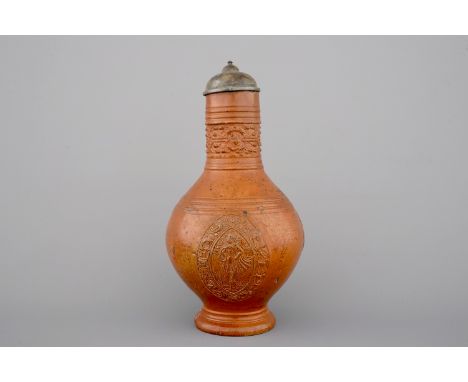 H: 29 cmCondition: ExcellentThe jug, with period pewter cover, decorated on the front with a medallion depicting the Roman go