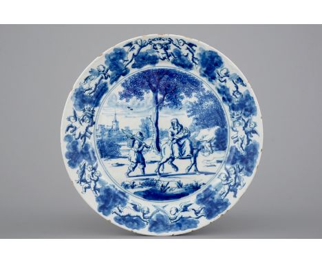 A fine Dutch Delft blue and white plate "The flight into Egypt", 1690-1710 An exceptionally well-painted plate centrally depi