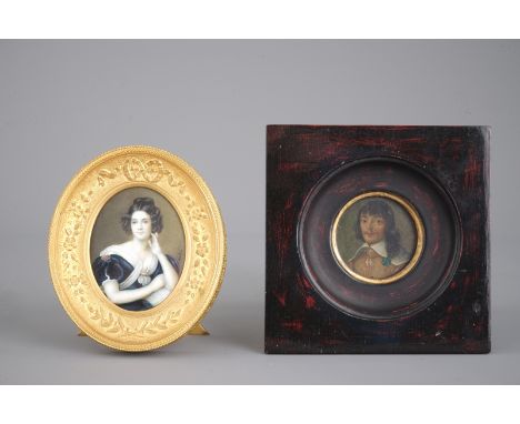 2 miniatures painted on ivory and copper, 18th and 19th C. The oval portrait of a lady painted on ivory, signed Audrey and in