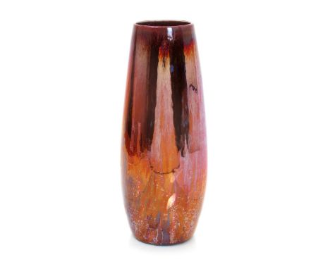 A Carter's Poole Pottery lustre vase probably designed by Owen Carter, dated 1904, slender, swollen cylindrical form covered 