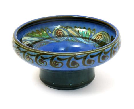 A Pilkington's Royal Lancastrian bowl by William S Mycock,  dated 1929, painted with a band of scrolling foliage in gold and 