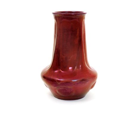 A Carter's Poole Pottery lustre vase designed by Owen Carter,  the swollen body with tapering modelled neck and everted rim, 