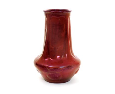 A Carter's Poole Pottery lustre vase designed by Owen Carter,  the swollen body with tapering modelled neck and everted rim, 