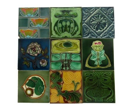 A Pilkington's Lancastrian tile designed by Lewis F Day,  dust-pressed with a stylised flower and foliage, glazed in shades o