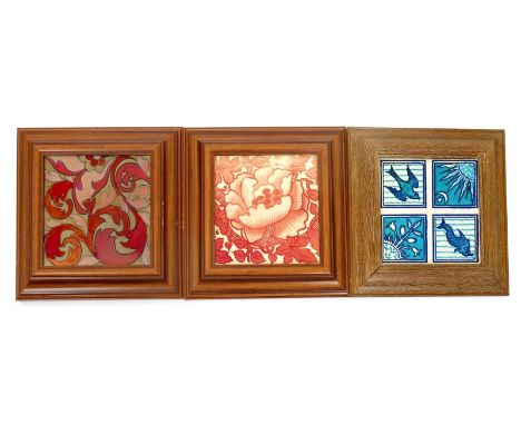 Two Maw & Co Ruby lustre tiles, painted with floral designs, framed, a Minton & Co encaustic tile in the manner of A.W.N Pugi