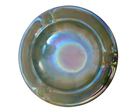 A Carter's Poole Pottery small lustre wall plate designed by Owen Carter or James Radley Young, circular, the rim with cast d