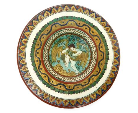 A Carlo Manzoni charger by PF, dated 1897, incised with a putti playing a harp, inside geometric bands, in colours incised ma