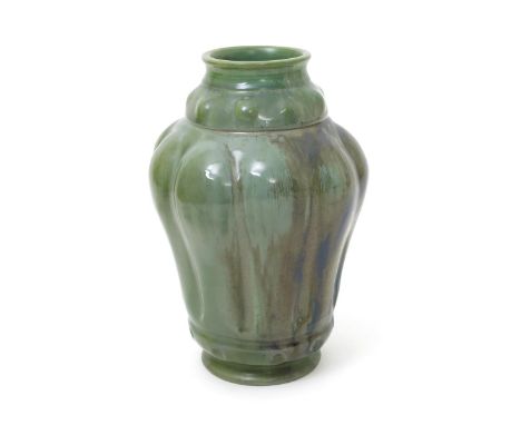 A Carter's Poole Pottery lustre vase designed by Owen Carter,  dated 1906, the swollen, gadrooned body with waisted neck, cov