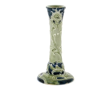 'Poppy' A James Macintyre candlestick designed by William Moorcroft, tubeline decorated with Art Nouveau poppy stems in blue 