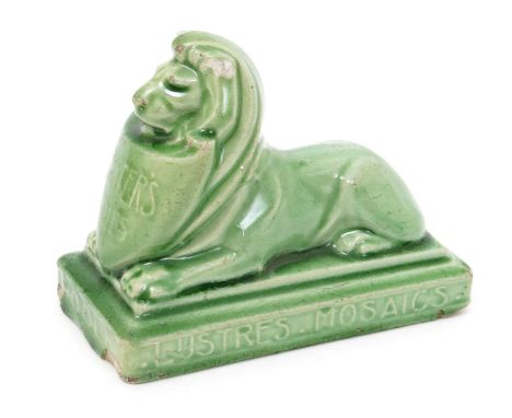 Carter's Tiles Poole an advertising paperweight,  modelled as a lion dormant holding a shield, inscribed Carter's Tiles, the 