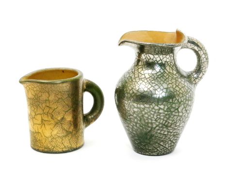 A Sunflower Pottery jug by Sir Edmund Elton, shouldered form with pinched top rim and loop handle, covered in a platinum lust