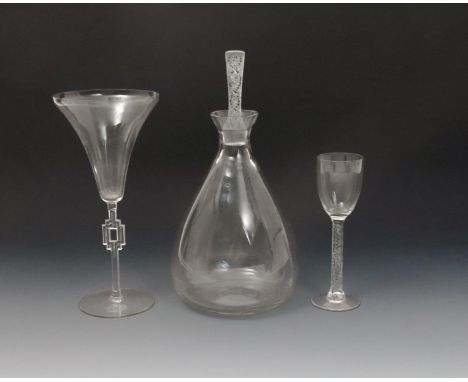'Phalsbourg' no. 5057 a Lalique clear glass decanter and stopper designed by Rene Lalique, a 'Phalsbourg' Lalique champagne g