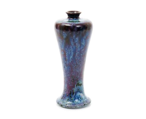 A Ruskin Pottery high-fired stoneware vase by William Howson Taylor, dated 1906, slender form, covered in a purple glaze with