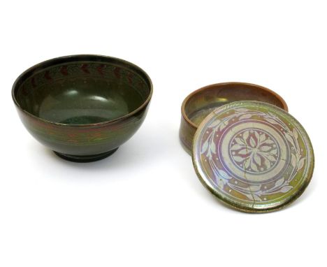 A Pilkington's Lancastrian bowl by Annie Burton, painted to the top rim with a simple band of berried foliage inside and  out