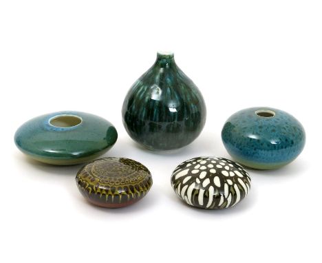 A Poole Pottery Studio vase, onion shaped, covered in a streaked green and blue glaze, two compressed vases similar and two P