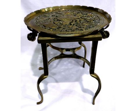 19th century brass footman and a pierced brass trivet, largest H: 30 cm. P&amp;P Group 3 (£25+VAT for the first lot and £5+VA