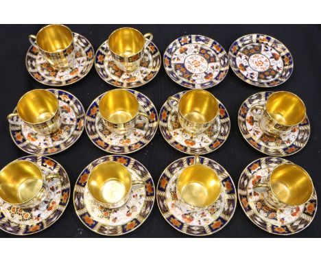 Ten Cauldon China 2614 pattern coffee cans and twelve saucers, one saucer with repair. P&amp;P Group 3 (£25+VAT for the first