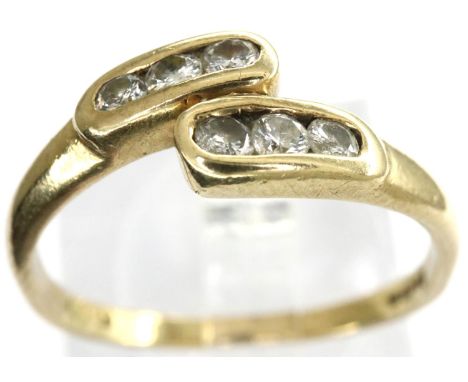 9ct gold crossover ring set with six diamonds, size N/O, 1.6g. P&amp;P Group 1 (£14+VAT for the first lot and £1+VAT for subs