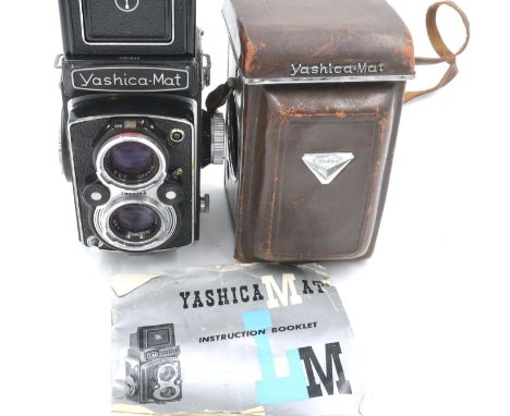 Yashica Mat camera, number 630643, leather cased with instruction manual. P&amp;P Group 1 (£14+VAT for the first lot and £1+V