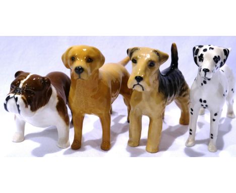 Four Beswick dogs, L: 13 cm, no cracks or chips. P&amp;P Group 2 (£18+VAT for the first lot and £3+VAT for subsequent lots) 