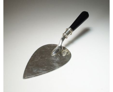 A silver presentation trowel, Burns, Oats & Washbourne Ltd, London 1937, the plain polished blade with turned ebonised handle