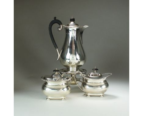 A three piece silver service, Harrison Brothers & Howson, London & Sheffield 1908, comprising; a baluster hot water jug on st