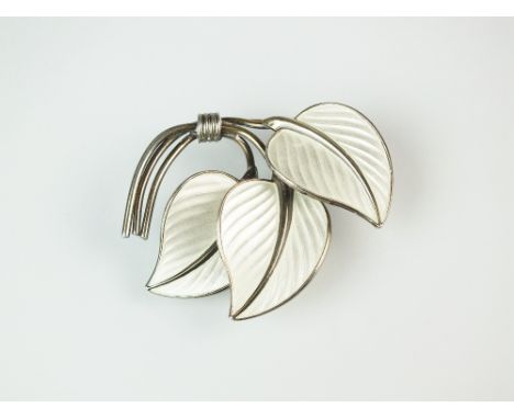 A Norwegian silver and enamel brooch, designed as three white enamel leaves with silver stems, stamped to the reverse '925 S 