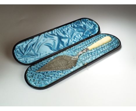 A cased Victorian silver presentation trowel, John Edward Bingham for Walker & Hall, Sheffield 1883, the blade with engraved 