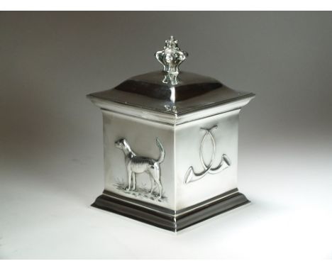 A silver tea caddy, Edward & John Barnard, London 1858, of square form with hunting themed panel decoration depicting embosse