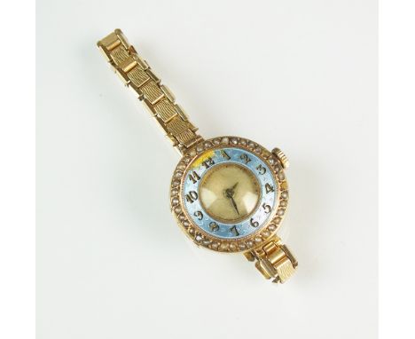 A lady's 9ct gold enamel and seed pearl set Rolex wristwatch, the white enamel decorative dial with black hands, the blue gui