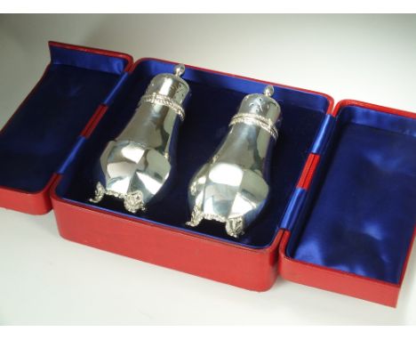 A cased pair of Victorian silver sugar casters, John Round & Son Ltd, Sheffield 1900, each of plain polished baluster form wi