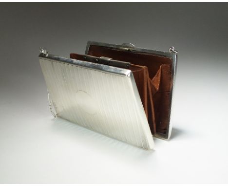 An early 20th century silver mounted purse, Charles S Green & Co Ltd,  Birmingham 1915, of tapering rectangular form with eng