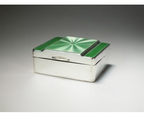 An Art Deco silver and green enamel mounted box, makers mark indistinct, Birmingham 1932, the plain polished rectangular box 