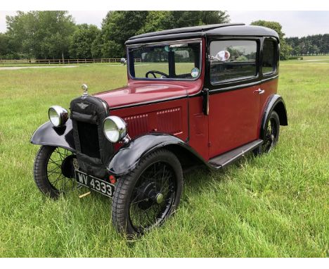 A 1933 Austin 7 box saloonRegistration number WV 4333Chassis number B8-8397Engine number 184791Maroon over blackThis charming