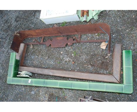 A metal fire kerb and tile kerb.